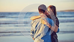 Youve got all of my heart. an affectionate young couple at the beach.