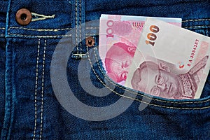 Yuan or RMB and Thai Baht in Jean's pocket