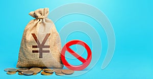 Yuan Yen money bag and red prohibition sign NO. Confiscation of deposits. Termination funding for projects. Monitoring suspicious