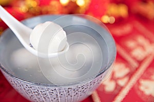 Yuanxiao or Tangyuan food in the Lantern Festival. The Chinese characters in the picture mean `happiness`