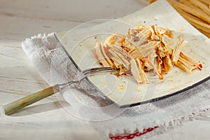 Yuba or fuju salad in a white bamboo plate.