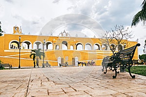 YUCATAN, MEXICO - MAY 31, 2015: Facade of the church view from the park