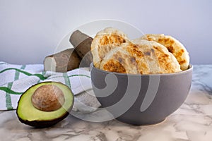 Yucca chunks and bread with avocado