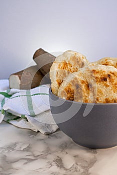 Yucca chunks and bread on background