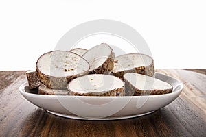 Yucca root in white bowl,vegetable