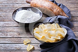 Yucca, yuca, cassava, manioca, mandioca chips and flour