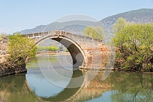 Yujin Bridge at Shaxi Ancient village. a famous Ancient village of Jianchuan, Yunnan, China.