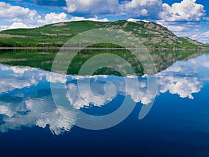 Yukon wilderness reflected on calm lake