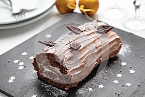 Yule log cake on a Christmas table