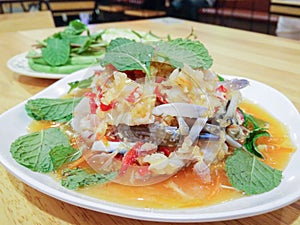 Yum Poo Maa,Thai spicy salad with raw crab.