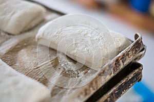 Yummy Fresh Raw Ciabatta Loaf on Tray