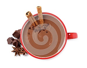 Yummy hot chocolate with cinnamon in red cup on white background, top view