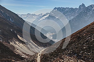 Yumthang Valley that view from high level to see the devious road line with cars in winter at Lachung. North Sikkim, India