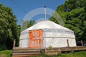 Yurta with national Mongolian patterns in summer day