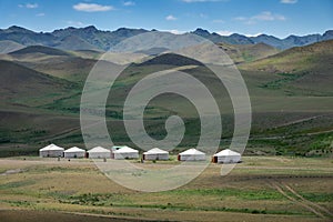 Yurts between montains in Mongolia