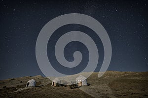 Yurts on the shore of Aral Sea on stars night, Karakalpakstan