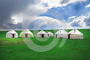 Yurts at Song Kol lake in Kyrgyzstan mountains.