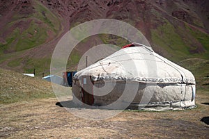 Yurts in the village on the road trip from Osh Kyrgyzstan photo