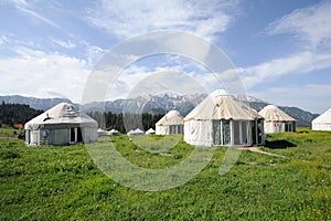 Yurts with white clouds