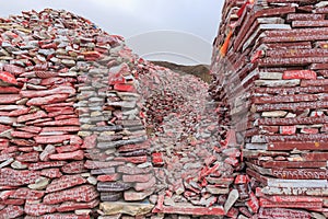 Mani stones with buddhist mantra Om Mani Padme Hum engraved in Tibetan in Yushu, China