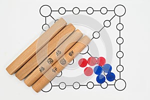 Yutnori is a traditional Korean board game that uses four wooden sticks called yut.