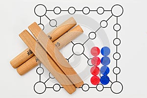 Yutnori is a traditional Korean board game that uses four wooden sticks called yut.