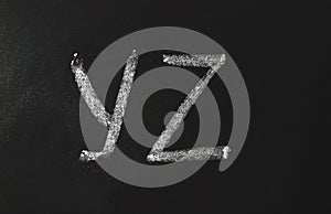 YZ  alphabet letters written in white chalk on a black chalkboard