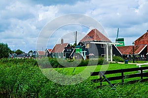 Zaanse Schans, Holland, August 2019. Northeast Amsterdam is a small community located on the Zaan River. View between the pretty