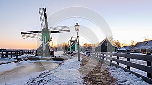 Zaanse Schans Netherlands a Dutch windmill village during sunset whit wooden house holland