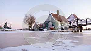 Zaanse Schans Netherlands a Dutch windmill village during sunset whit wooden house holland