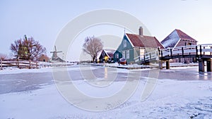 Zaanse Schans Netherlands a Dutch windmill village during sunset whit wooden house holland