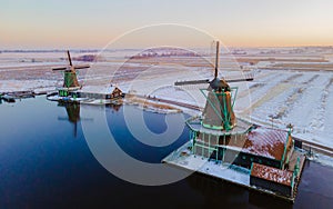 Zaanse Schans Netherlands a Dutch windmill village during sunset whit wooden house holland