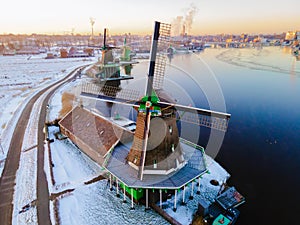 Zaanse Schans Netherlands a Dutch windmill village during sunset whit wooden house holland