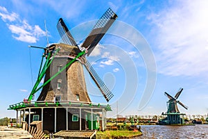 Zaanse Schans village near Zaandam, The Netherlands. Typical landscape with windmills during summer sunny day