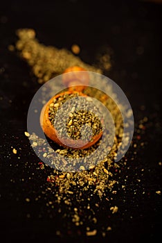 Zaatar spice mix in wooden spoon