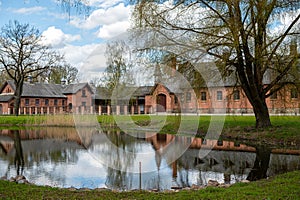 Zagare manor stables on a sunny spring day, Lithuania photo