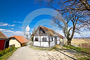 Zagorje hills cottage and st. Vinko statue