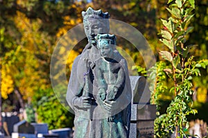 Zagreb, Croatia â€“ October 2018. a monument of Madonna and baby Jesus to the city cemetery during a sunny autumn day