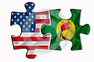 Zaire flag and United States of America flag on two puzzle pieces on white isolated background. The concept of political relations