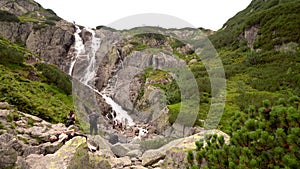 Zakopane, Poland - August 15, 2021: Siklawa waterfall or Wielka Siklawa in the High Tatras, on the Roztoka stream. It falls from