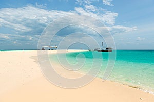 Zanzibar beach and touristic boats in the ocean