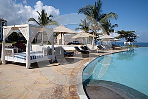 Beach cabanas poolside, at Royal Zanzibar Resort, overlooking the Indian Ocean