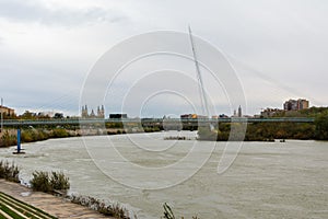 Zaragoza, Spain/Europe; 24/11/2019: Volunteer Walkway (Pasarela del Voluntariado) over the Ebro river in Zaragoza, Spain photo