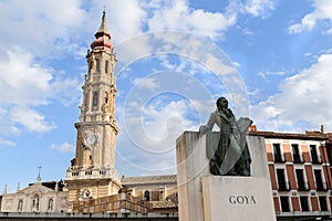 Zaragoza, Spain, Statue of Francisco de Goya with the tower of the Savior Cathedral photo