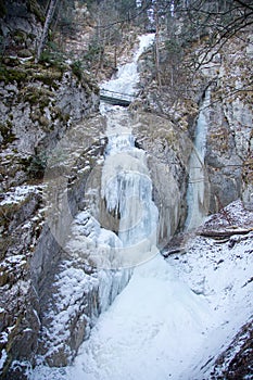 Zavojovy waterfall in winter in Falcon valley, Slovak Paradise National park, Slovakia