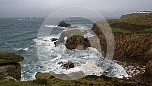 Zawn Wells with Rock Arch of Enys Dodnan