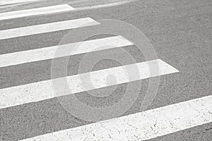 Zebra crossing painted on the asphalt traffic information for pedestrians and drivers