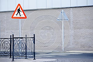 Zebra crossing and pedestrian road sign