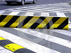 Zebra crossing and speed-bump on the street