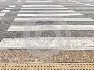 Zebra crossing white lines on road. pedestrian crossing, white stripes on black asphalt. Accident